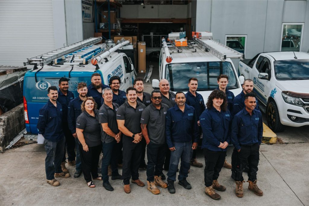 Thompson Cooling technician installing split system air conditioner