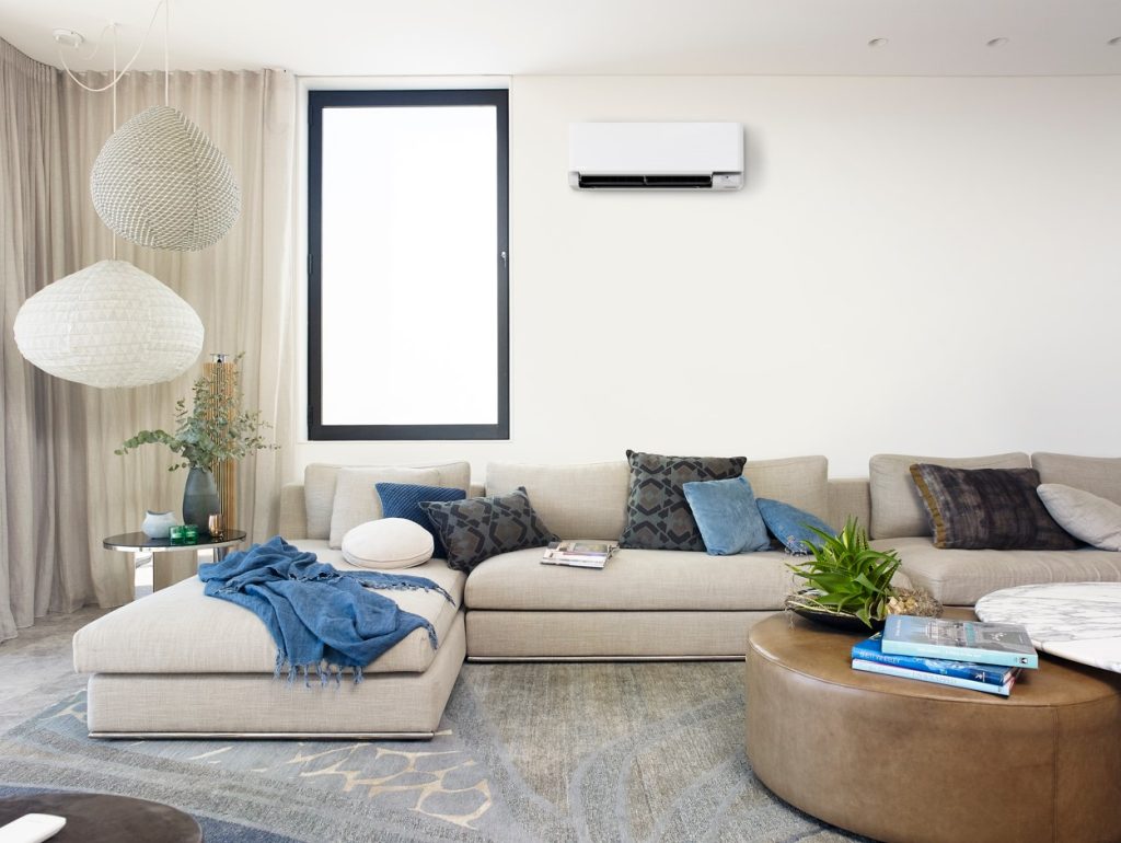 Modern home interior with wall-mounted air conditioner in living space
